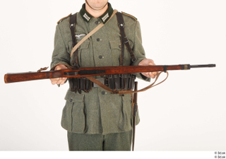 Photo man in German uniform with rifle WW II 3…